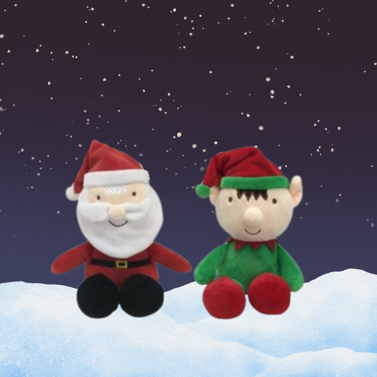 Two plush toys, green and red Christmas colours on a background of snow and starry sky